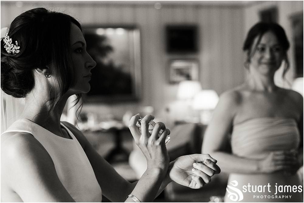 Creative natural photographs showing the final preparations for the gorgeous bride ahead of the wedding at Weston Park in Shropshire by Shropshire Wedding Photographer Stuart James