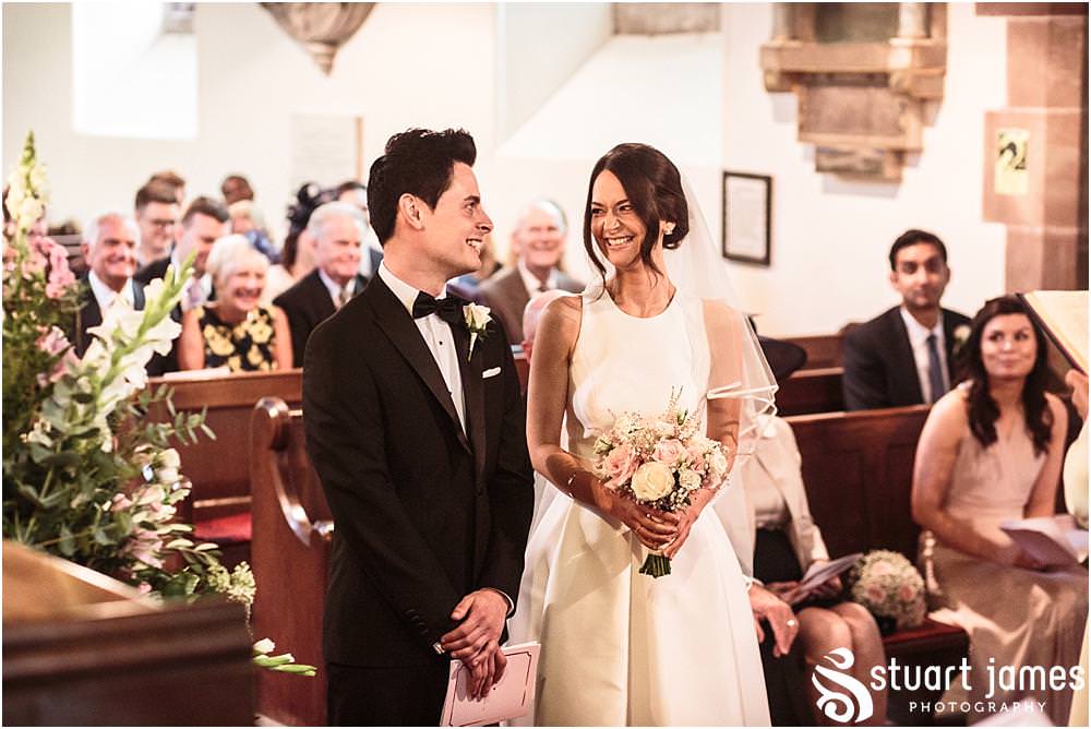 Unobtrusive storytelling photographs showing the wedding ceremony at Weston Park in Shropshire by Shropshire Wedding Photographer Stuart James