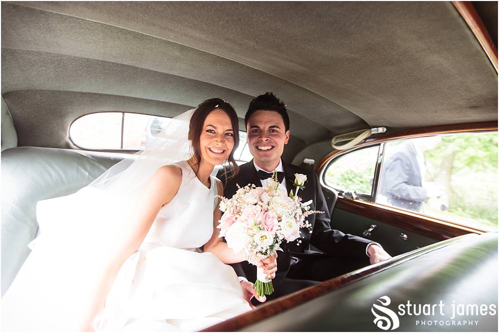 Confetti exit for our beautiful bride and groom from the church at Weston Park in Shropshire by Shropshire Wedding Photographer Stuart James