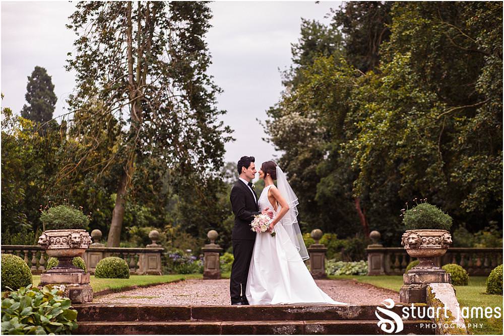 Relaxed natural portraits of the bride and groom around the stunning gardens at Weston Park in Shropshire by Shropshire Wedding Photographer Stuart James