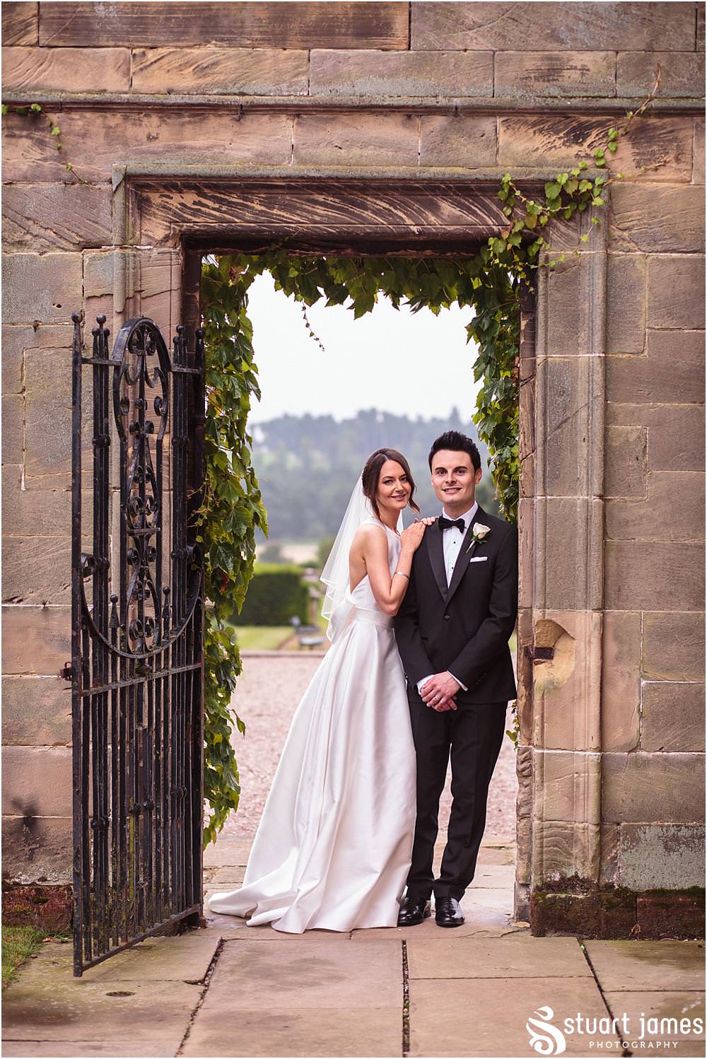 Relaxed natural portraits of the bride and groom around the stunning gardens at Weston Park in Shropshire by Shropshire Wedding Photographer Stuart James