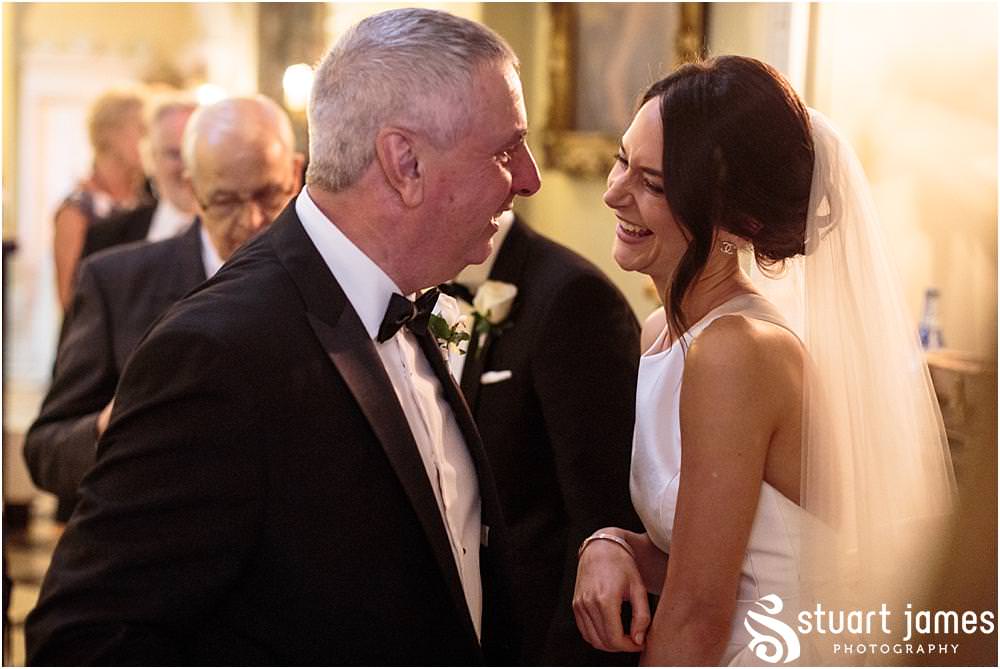 Beautiful natural moments for the bride and groom greeting the guests at Weston Park in Shropshire by Shropshire Wedding Photographer Stuart James
