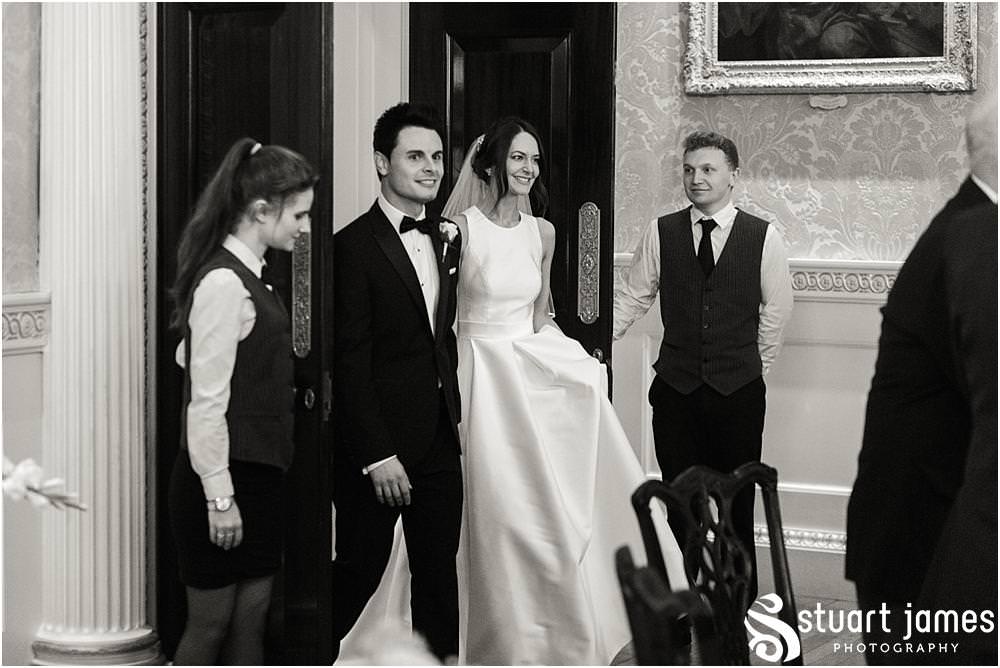 Beautiful natural moments for the bride and groom greeting the guests at Weston Park in Shropshire by Shropshire Wedding Photographer Stuart James