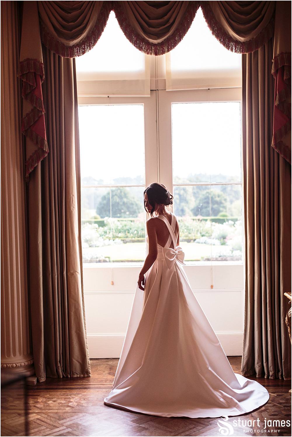 Utilising the stunning character of the building for elegant portraits of the bride and groom at Weston Park in Shropshire by Shropshire Wedding Photographer Stuart James