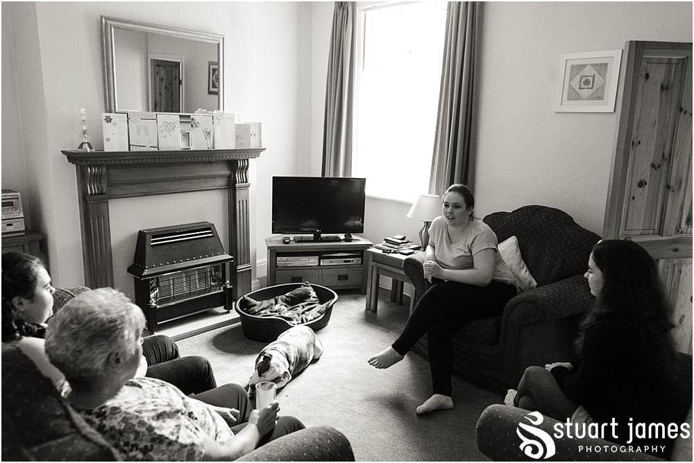 Creative candid photographs of the wedding morning preparations for the bridal party at All Saints Church in Bloxwich by Walsall Wedding Photographers Stuart James