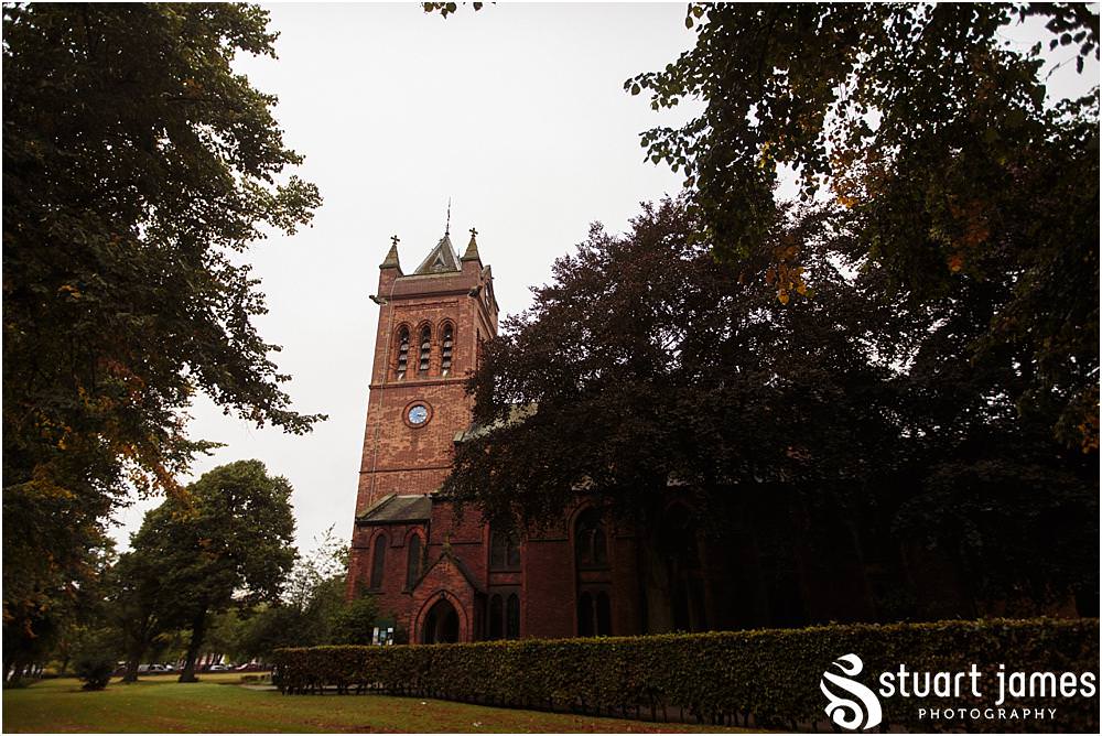 Creative photographs capturing the mood and excitement as the guests arrive for the wedding ceremony at All Saints Church in Bloxwich by Walsall Wedding Photographers Stuart James