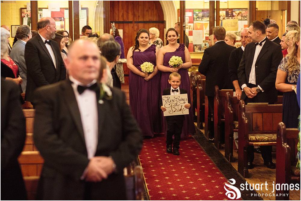 Creative unobtrusive photographs of the wedding ceremony at All Saints Church in Bloxwich by Walsall Wedding Photographers Stuart James