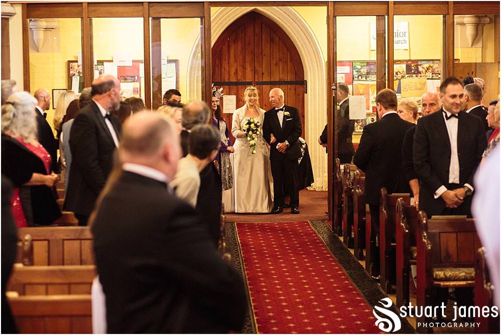 Creative unobtrusive photographs of the wedding ceremony at All Saints Church in Bloxwich by Walsall Wedding Photographers Stuart James