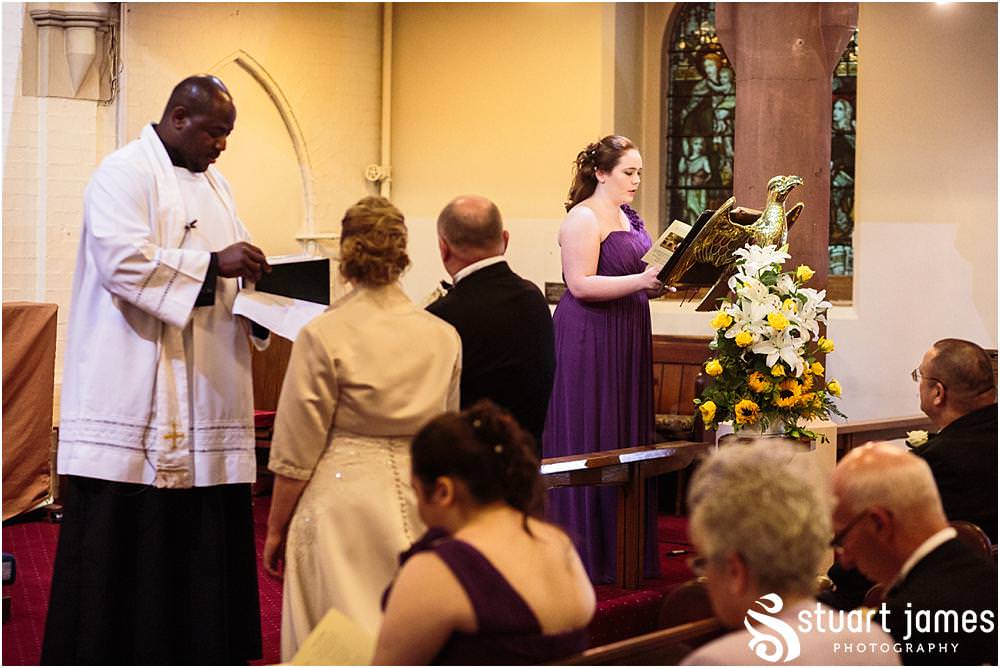 Creative unobtrusive photographs of the wedding ceremony at All Saints Church in Bloxwich by Walsall Wedding Photographers Stuart James