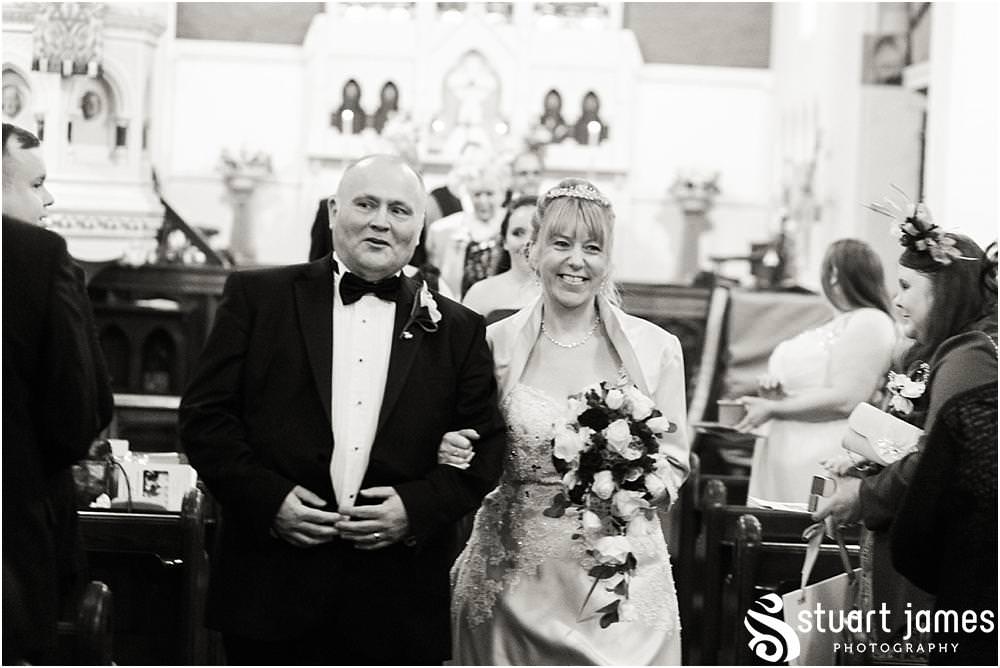 Creative unobtrusive photographs of the wedding ceremony at All Saints Church in Bloxwich by Walsall Wedding Photographers Stuart James