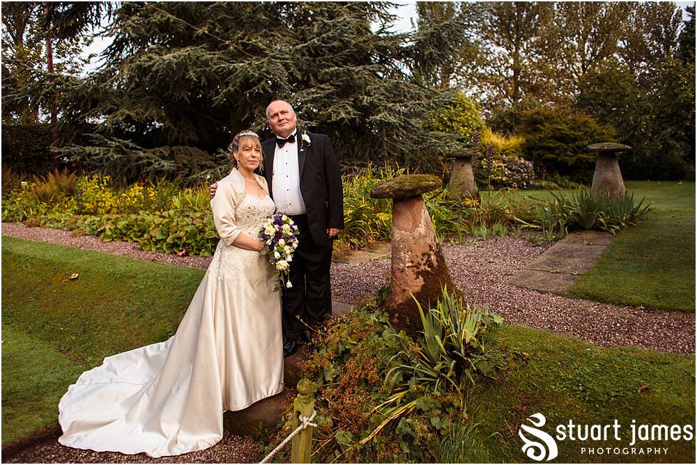 Truly stunning and relaxed photographs of the bride and groom around the beautiful gardens at the Barn Wedding Venue in Lichfield by Walsall Wedding Photographers Stuart James