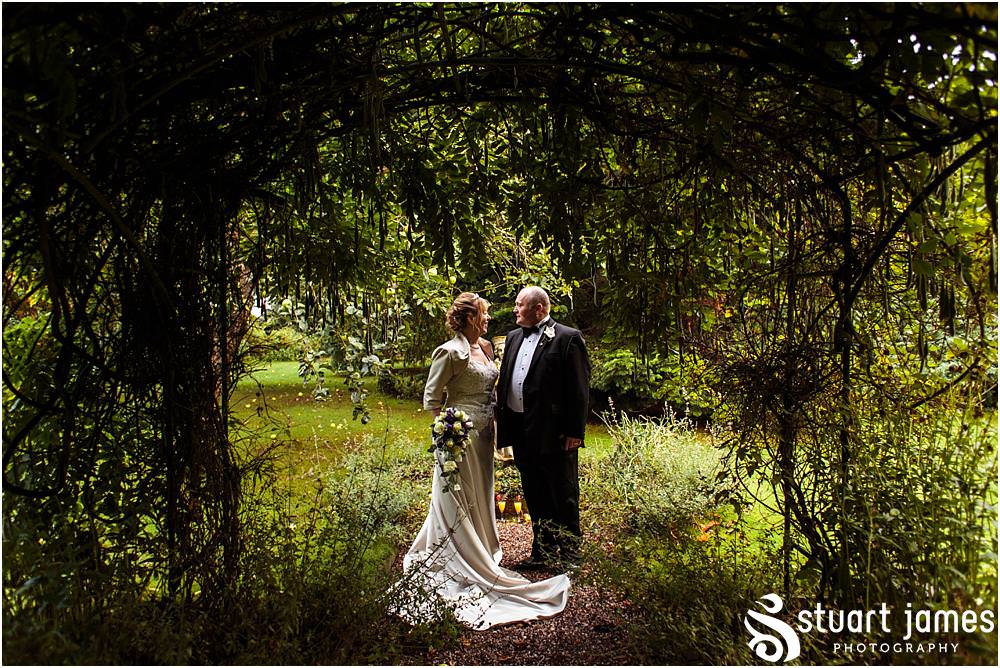 Truly stunning and relaxed photographs of the bride and groom around the beautiful gardens at the Barn Wedding Venue in Lichfield by Walsall Wedding Photographers Stuart James