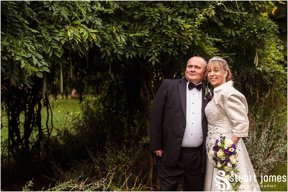 Truly stunning and relaxed photographs of the bride and groom around the beautiful gardens at the Barn Wedding Venue in Lichfield by Walsall Wedding Photographers Stuart James