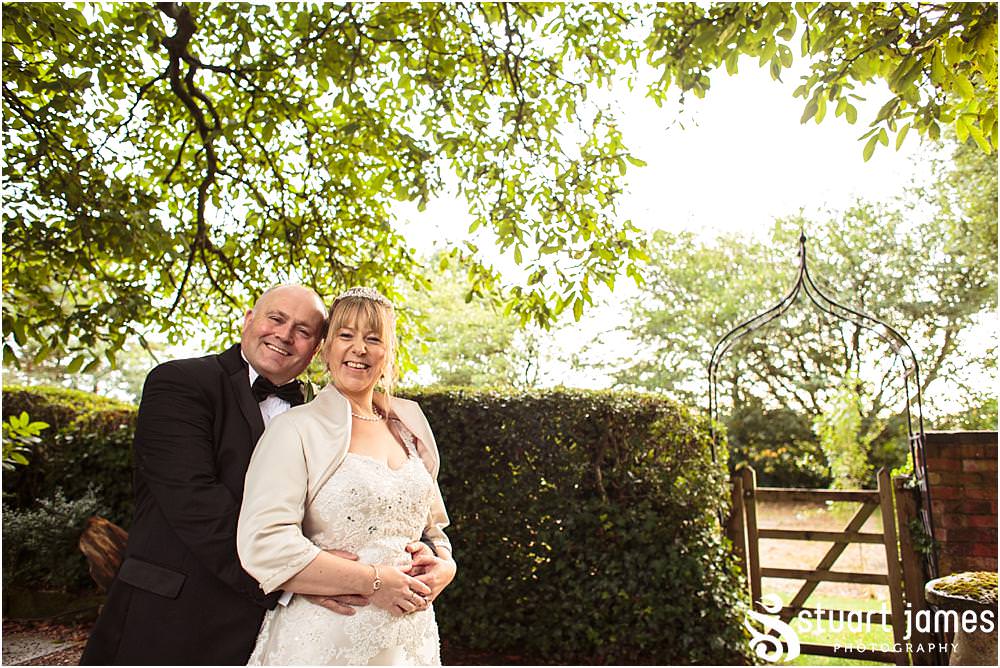 Truly stunning and relaxed photographs of the bride and groom around the beautiful gardens at the Barn Wedding Venue in Lichfield by Walsall Wedding Photographers Stuart James