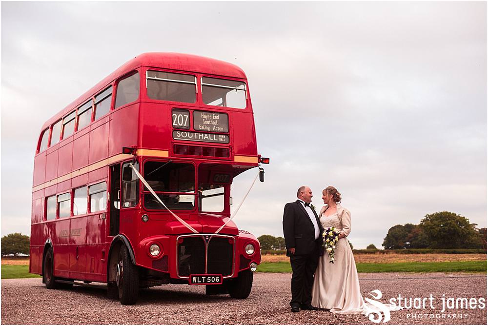 Creative photographs of the bride and groom with their wedding transport at the Barn Wedding Venue in Lichfield by Walsall Wedding Photographers Stuart James