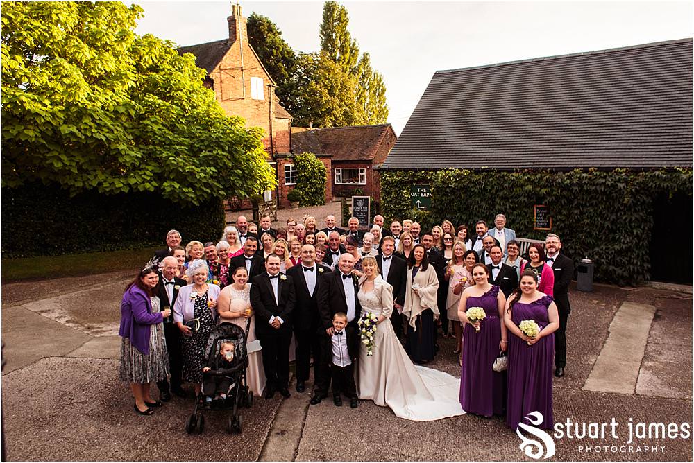 Confetti fun for the wedding party at the Barn Wedding Venue in Lichfield by Walsall Wedding Photographers Stuart James
