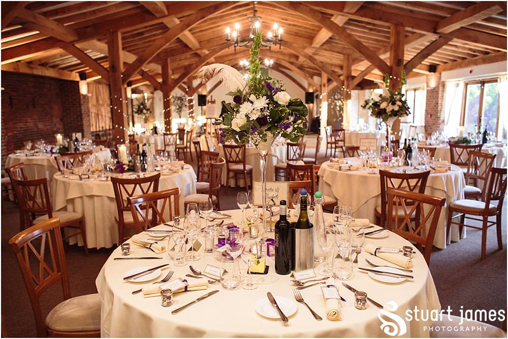 Such stunning styling and decoration for the wedding breakfast in the Oat Barn at the Barn Wedding Venue in Lichfield by Walsall Wedding Photographers Stuart James