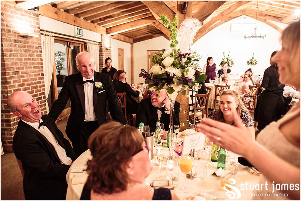 An inspired choice for the wedding breakfast with a slow roasted feast for the guests to enjoy at the Barn Wedding Venue in Lichfield by Walsall Wedding Photographers Stuart James