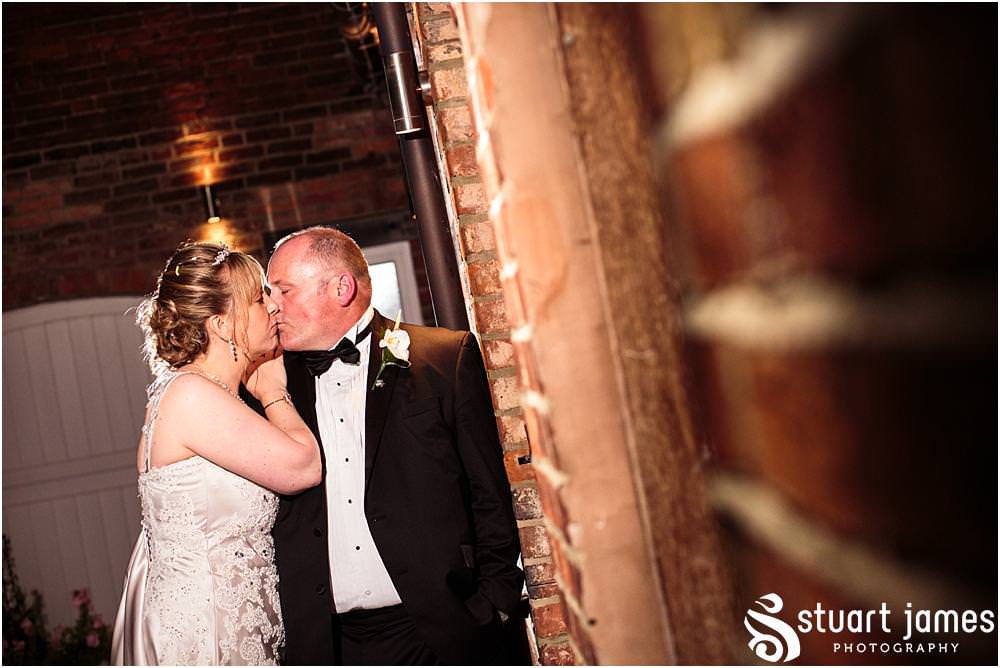Creative signature nighttime portraits adding the "wow" to the wedding story at the Barn Wedding Venue in Lichfield by Walsall Wedding Photographers Stuart James