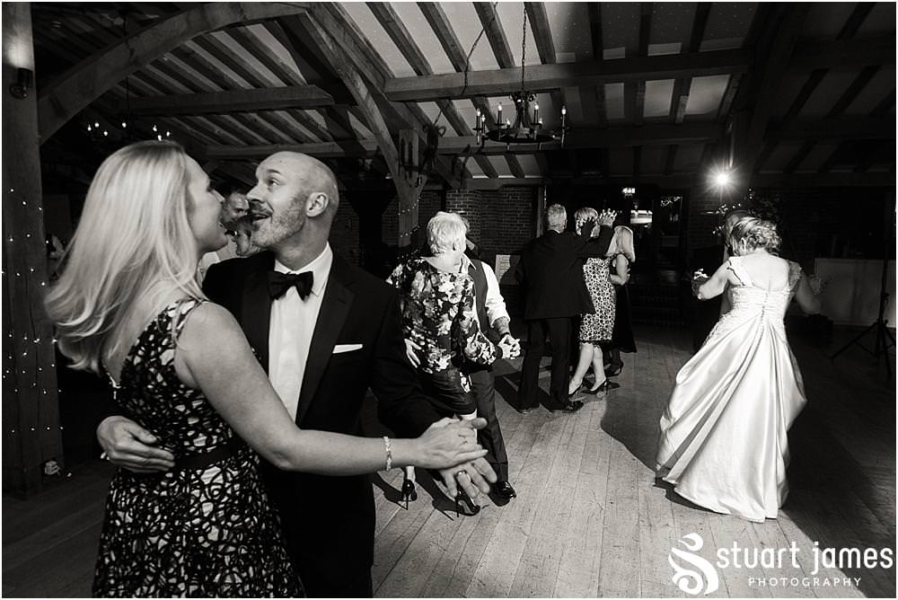 Capturing the beautiful first dance and start of the evening reception with live performance from Gary Grace and the Swing Kings at the Barn Wedding Venue in Lichfield by Walsall Wedding Photographers Stuart James