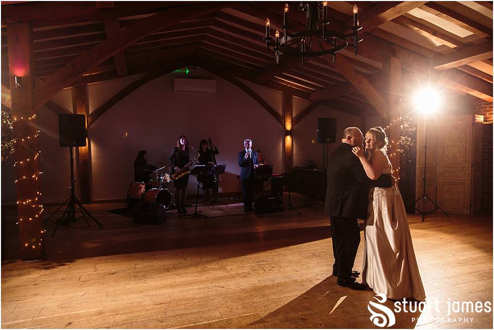 Capturing the beautiful first dance and start of the evening reception with live performance from Gary Grace and the Swing Kings at the Barn Wedding Venue in Lichfield by Walsall Wedding Photographers Stuart James
