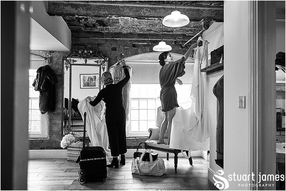 Photos capturing the story of the wedding as the bridal party arrive for the wedding at The West Mill in Derby by West Mill Wedding Photographers Stuart James