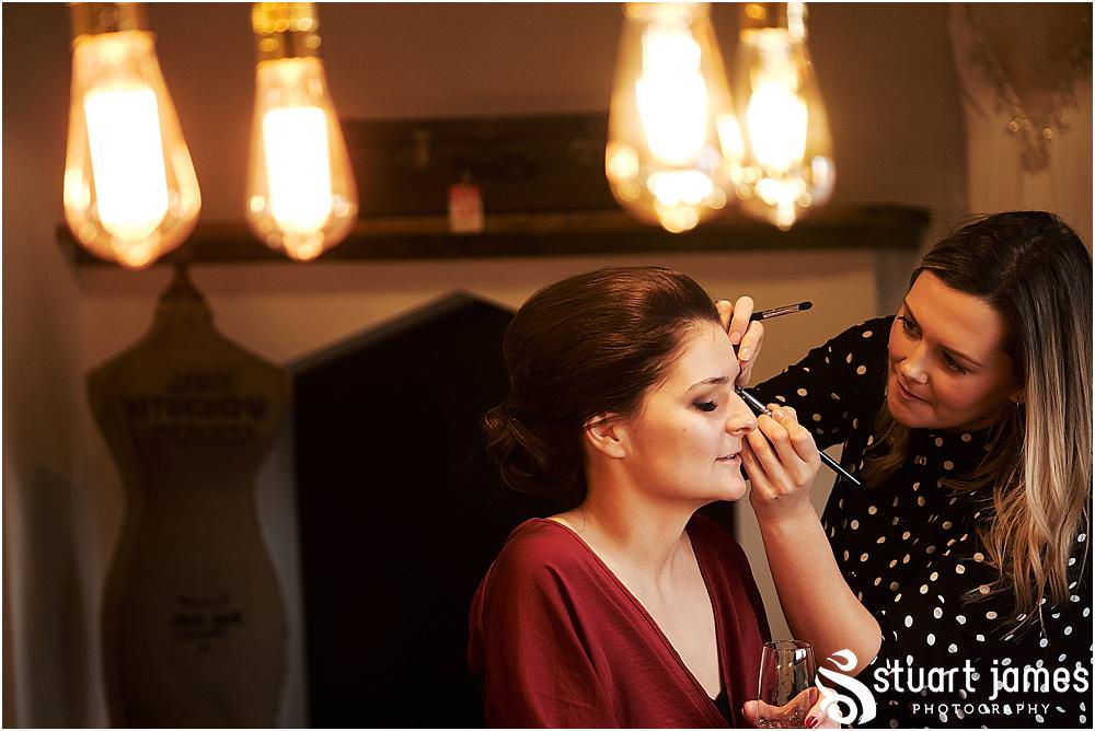 Beautiful moments during the wedding morning preparations for the bride and bridesmaids at The West Mill in Derby by West Mill Wedding Photographers Stuart James