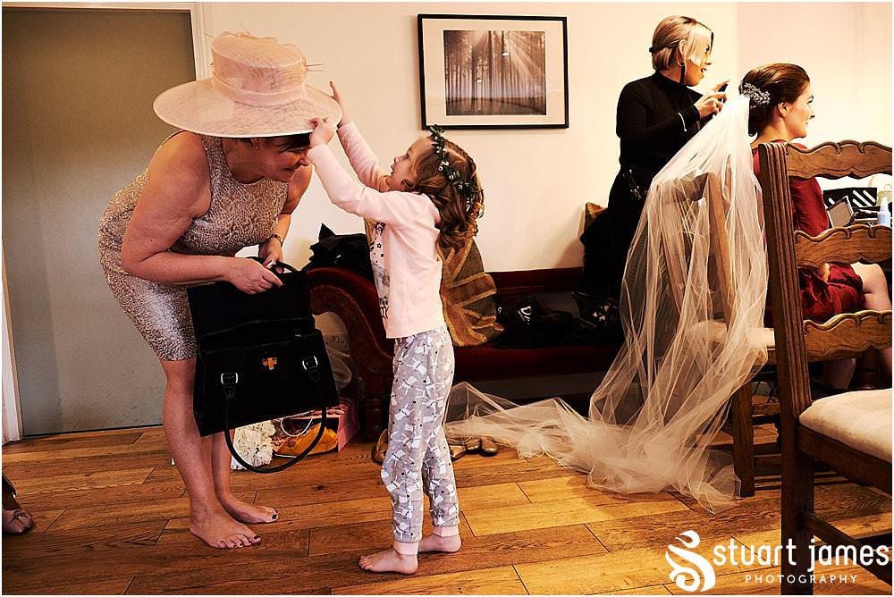 Capturing the characters and the moments that bring the memories of the wedding morning flooding back at The West Mill in Derby by West Mill Wedding Photographers Stuart James