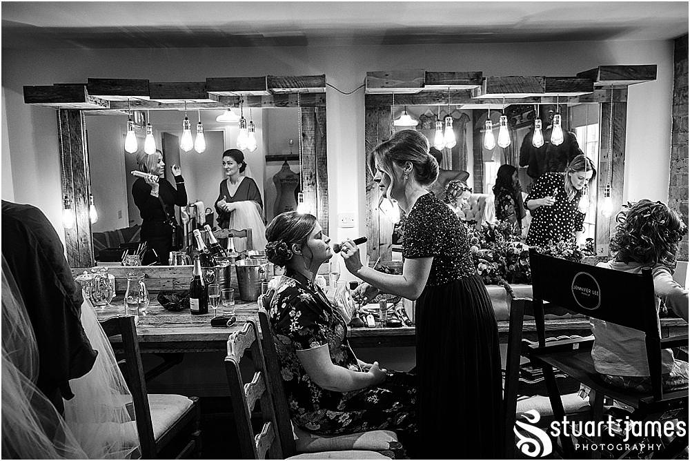 Capturing the characters and the moments that bring the memories of the wedding morning flooding back at The West Mill in Derby by West Mill Wedding Photographers Stuart James