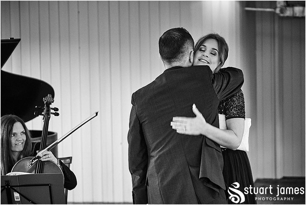 Photos of a beautiful private moment for the Groom ahead of the wedding ceremony at The West Mill in Derby by West Mill Wedding Photographers Stuart James