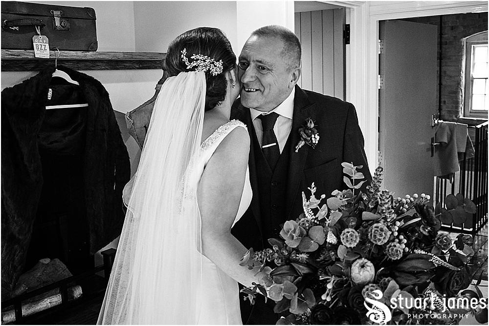 Documenting the entrance of the bride into the wedding ceremony at The West Mill in Derby by West Mill Wedding Photographers Stuart James