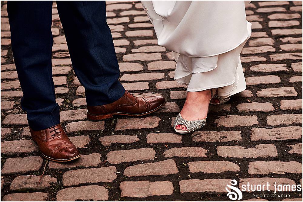 The Mill House at The West Mill in Derby made for the perfect backdrop for photographs with the bride and groom portraits by West Mill Wedding Photographers Stuart James
