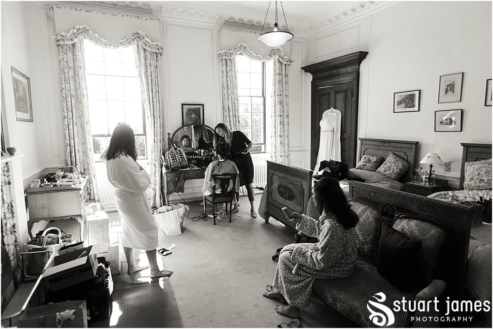 Documenting the bridal preparations in the beautiful bedrooms at Davenport House in Shropshire by Davenport House Wedding Photographers Stuart James