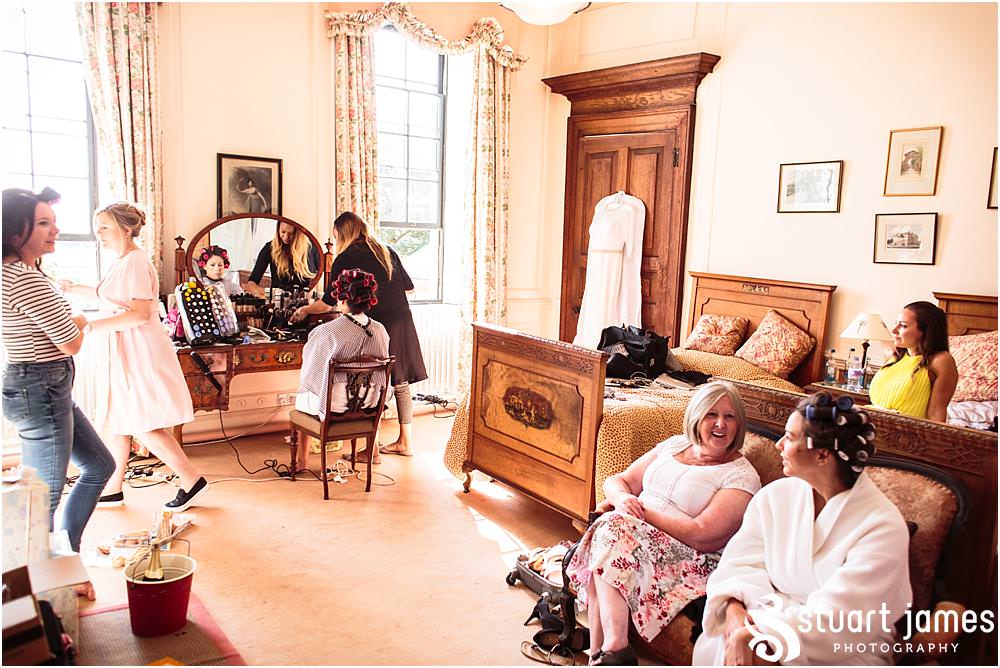 Documenting the bridal preparations in the beautiful bedrooms at Davenport House in Shropshire by Davenport House Wedding Photographers Stuart James