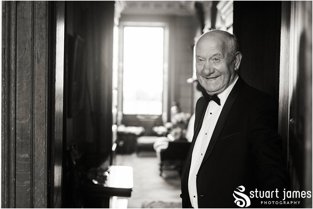 Beautiful moment as the Father of the Bride sees his daughter in her gorgeous wedding dress at Davenport House in Shropshire by Davenport House Wedding Photographers Stuart James