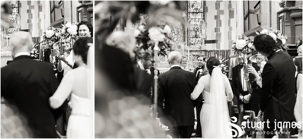 Unobtrusive photographs capturing the beautiful ceremony at St Chads Church in Pattingham by Davenport House Wedding Photographers Stuart James