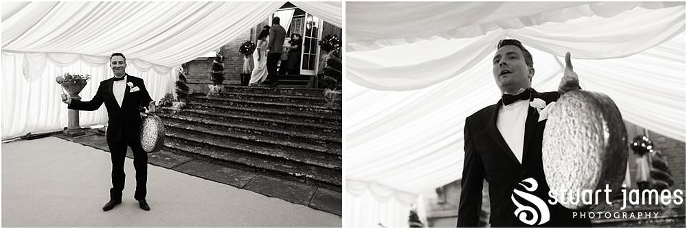 Capturing the party getting started early with the guests enjoying the wedding breakfast at Davenport House in Shropshire by Davenport House Wedding Photographers Stuart James