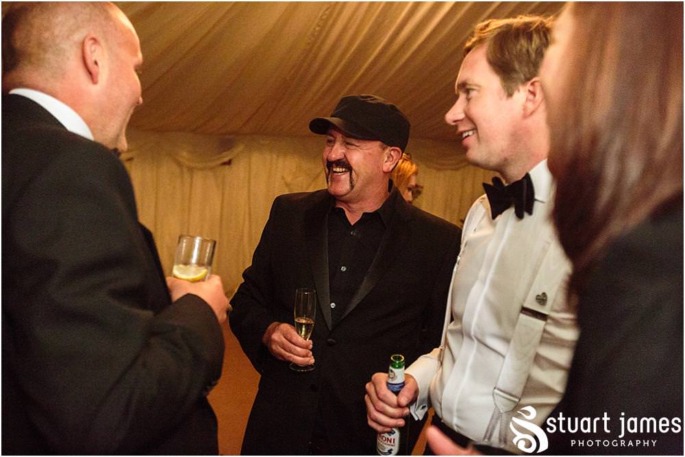 Live music from Low Riders Band really getting the wedding reception into fabulous style at Davenport House in Shropshire by Davenport House Wedding Photographers Stuart James