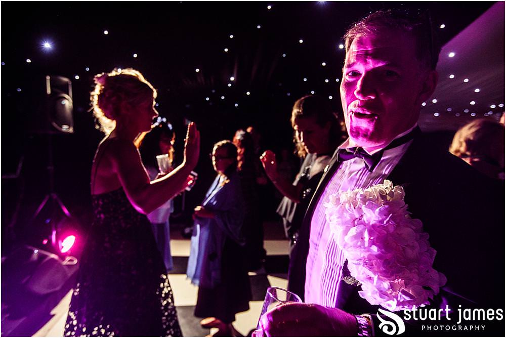 Live music from Low Riders Band really getting the wedding reception into fabulous style at Davenport House in Shropshire by Davenport House Wedding Photographers Stuart James