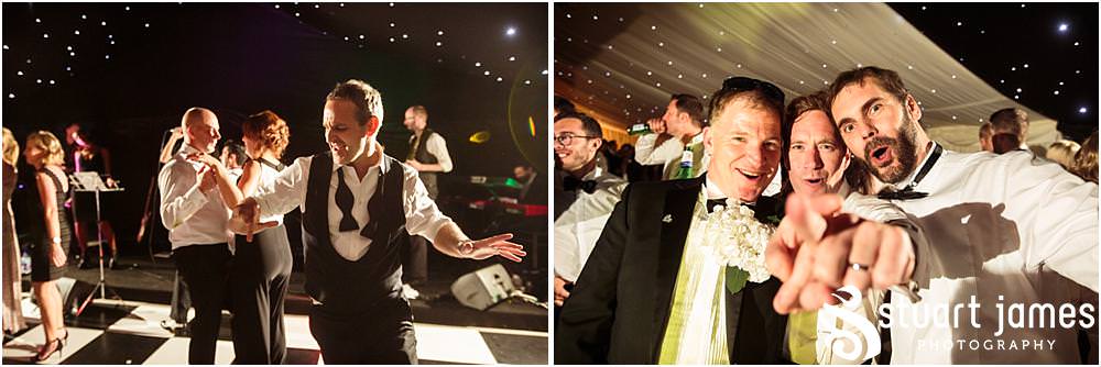 Live music from Low Riders Band really getting the wedding reception into fabulous style at Davenport House in Shropshire by Davenport House Wedding Photographers Stuart James