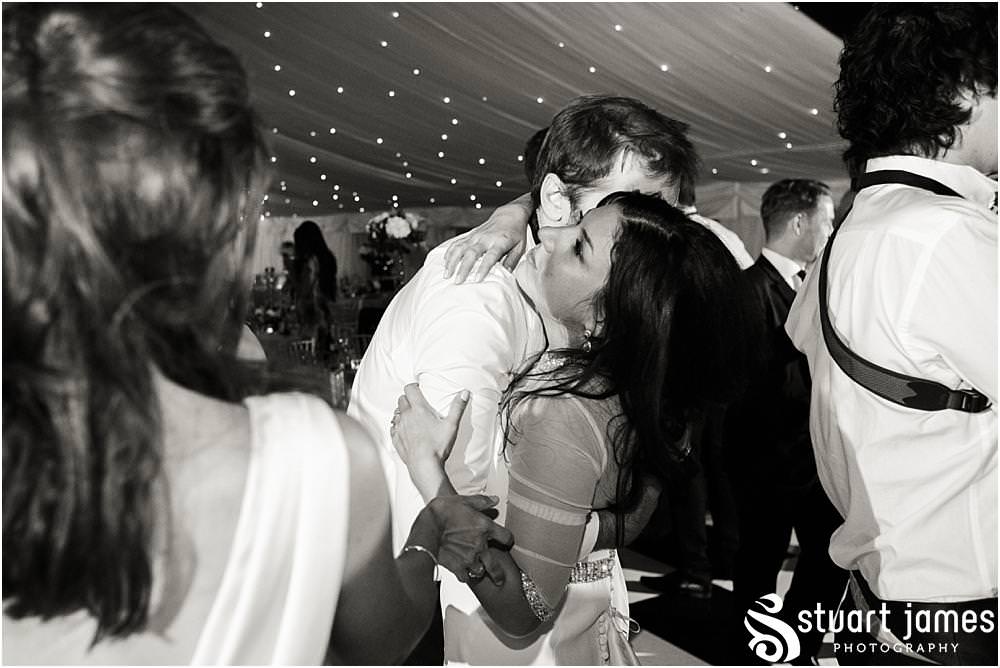 Photos showing the truly amazing night as the guests get down and party at Davenport House in Shropshire by Davenport House Wedding Photographers Stuart James