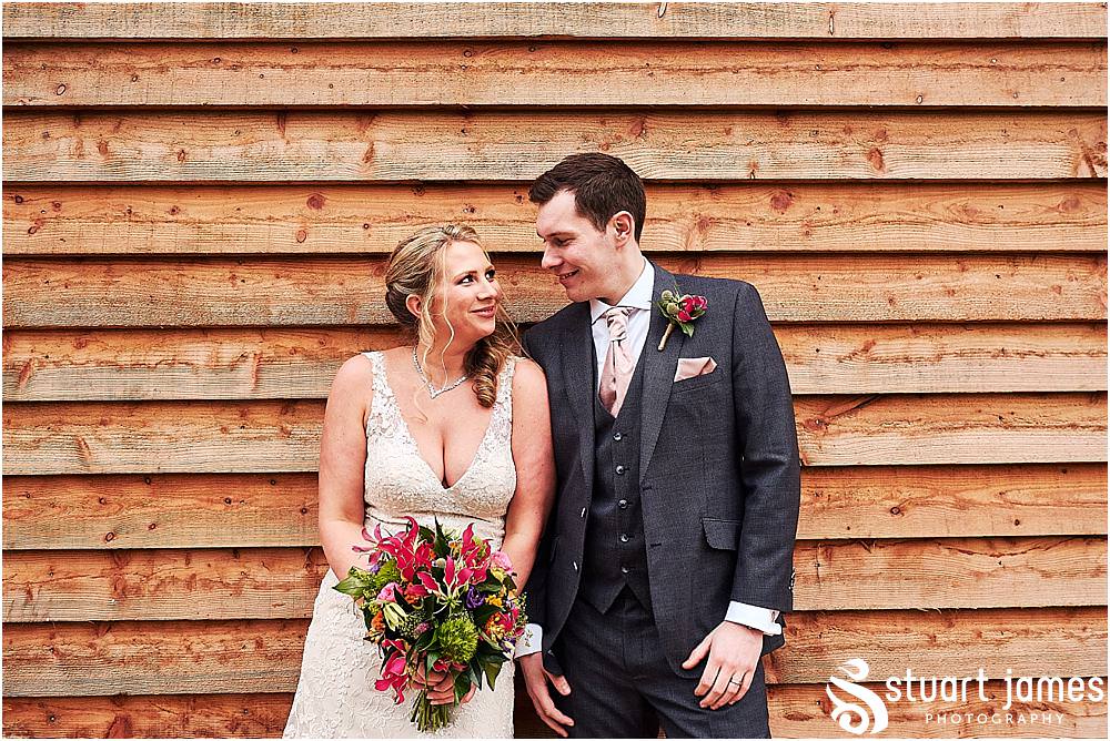Creative, comfortable and natural photographs of the Bride and Groom utilising the stunning barn at The Mill Barns in Alveley by Mill Barns Wedding Photographers Stuart James