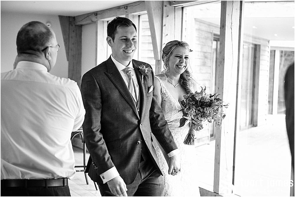Capturing the guests enjoying the fabulous setting for the wedding breakfast at The Mill Barns in Alveley by Mill Barns Wedding Photographers Stuart James