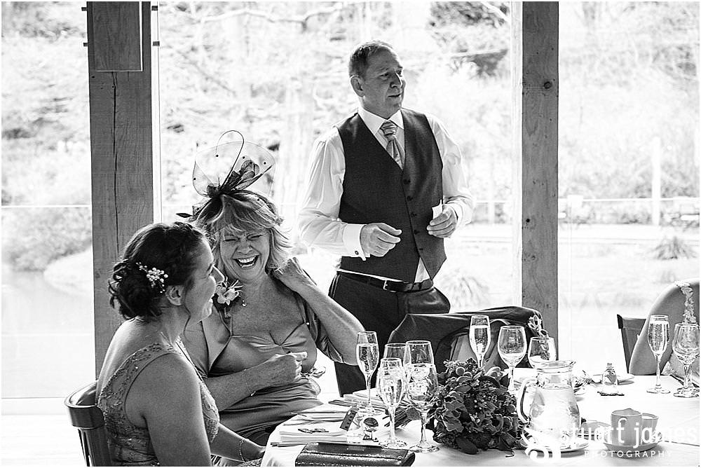 Photos that show the reactions and the emotions on display for the wedding party during the Father of the Bride's speech at The Mill Barns in Alveley by Mill Barns Wedding Photographers Stuart James