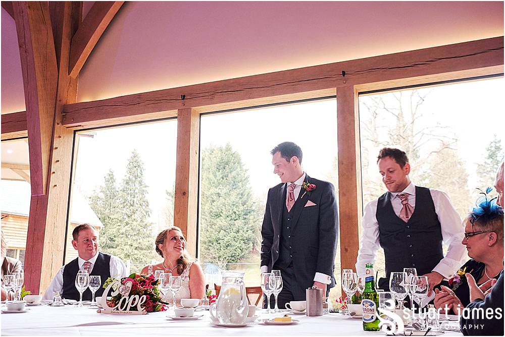So many laughs for the guests as the Best Man regaled past stories for the groom during the wedding breakfast speeches at The Mill Barns in Alveley by Mill Barns Wedding Photographers Stuart James
