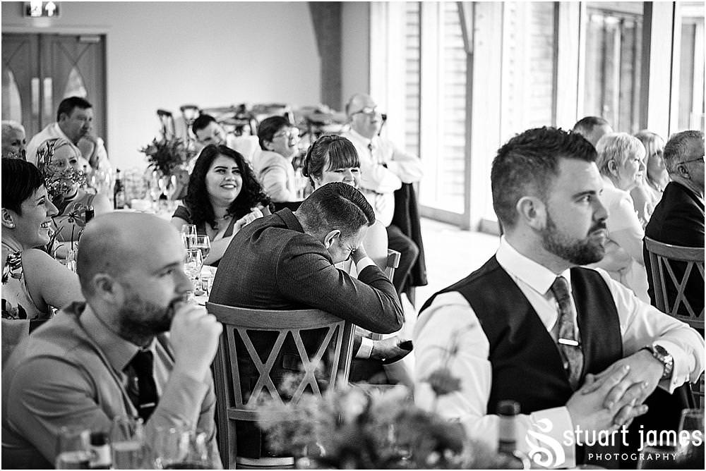 So many laughs for the guests as the Best Man regaled past stories for the groom during the wedding breakfast speeches at The Mill Barns in Alveley by Mill Barns Wedding Photographers Stuart James