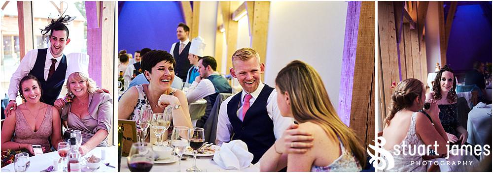Creative candid photographs of the guests enjoying the wedding breakfast at The Mill Barns in Alveley by Mill Barns Wedding Photographers Stuart James