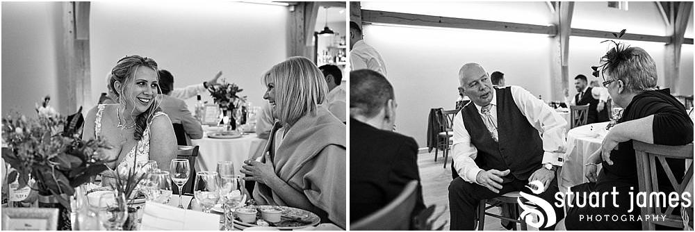 Creative candid photographs of the guests enjoying the wedding breakfast at The Mill Barns in Alveley by Mill Barns Wedding Photographers Stuart James