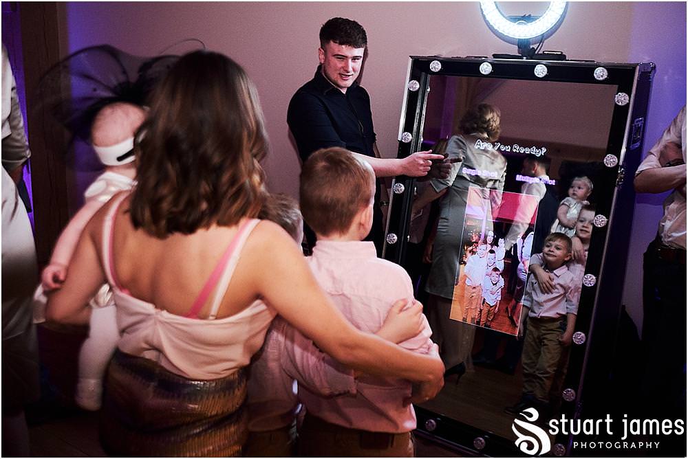 Capturing the fun of the evening getting underway for the wedding guests at The Mill Barns in Alveley by Mill Barns Wedding Photographers Stuart James