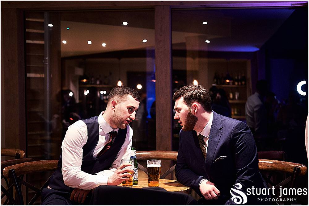 Capturing the fun of the evening getting underway for the wedding guests at The Mill Barns in Alveley by Mill Barns Wedding Photographers Stuart James
